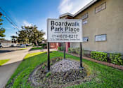 Thumbnail 4 of 8 - A sign for Boardwalk Park Place apartment homes is shown.