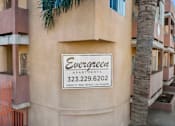 Thumbnail 5 of 10 - The building is called Evergreen Apartments.