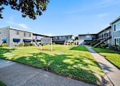 Thumbnail 4 of 7 - A sunny day at the Palmetto Dental Centre with a clear blue sky.