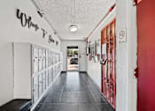 Thumbnail 5 of 11 - A long hallway with a sign that says "Where To Shim".