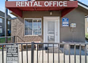 Thumbnail 3 of 13 - A rental office building with a sign that says "future resident and office parking only".