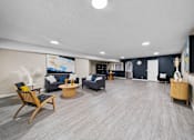 Thumbnail 13 of 15 - A spacious living room with a grey carpet and wooden flooring.