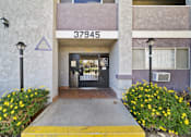 Thumbnail 4 of 14 - The image shows the front of a building with the number 37945 on it.