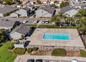 Thumbnail 13 of 15 - Drone view of Cotton Wood Apartment's hot tub and pool.
