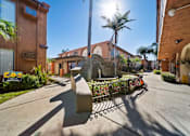 Thumbnail 6 of 70 - A sunny day at a residential area with a clear blue sky.