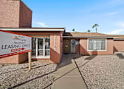 Thumbnail 1 of 10 - A leasing office for River Springs Apartments is shown.