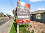 Thumbnail 3 of 13 - A sign for Andover Place Apartment Homes with a leasing office phone number.
