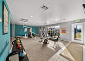 Thumbnail 5 of 17 - A gym with a variety of equipment including a treadmill, weights, and a bench press.