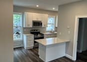 Thumbnail 61 of 65 - Unit 3 Kitchen