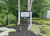 Thumbnail 1 of 18 - a yard with a sign for yarmouth green apartment homes