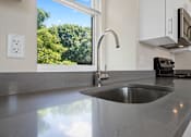 Thumbnail 8 of 18 - Taymil 125 Charles Apartment Homes Kitchen