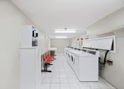Thumbnail 15 of 24 - Taymil East Shore Apartment Homes Laundry Facility