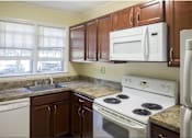 Thumbnail 8 of 24 - Taymil Holly House Kitchen