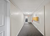 Thumbnail 4 of 18 - Taymil Waterman Square Apartment Homes Building Hallway