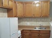 Thumbnail 5 of 18 - Taymil Waterman Square Apartment Homes Kitchen