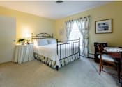 Thumbnail 17 of 40 - Taymil Woodruff Court Bedroom