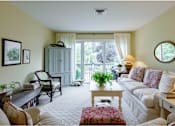 Thumbnail 8 of 40 - Taymil Woodruff Court Living Room