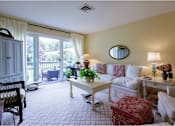 Thumbnail 9 of 40 - Taymil Woodruff Court Living Room