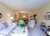 Thumbnail 10 of 40 - Taymil Woodruff Court Living Room