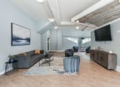 Thumbnail 11 of 14 - a living room with a couch and a tv at Harrison Grande, Cary, NC, 27513
