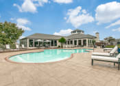 Thumbnail 8 of 10 - Sparkling Pool with Sundeck at The Atlantic Stone Oak Apartments, San Antonio Texas