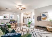 Thumbnail 3 of 10 - Living Room at The Atlantic Stone Oak Apartments, San Antonio, TX