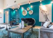 Thumbnail 2 of 17 - Clubhouse with Lounge area at Vintage Park Apartments, Houston, Texas