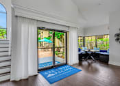 Thumbnail 4 of 23 - A room with a blue mat at Boca Colony Apartments, Boca Raton, FL