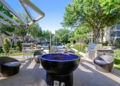 Thumbnail 3 of 14 - Outdoor Entertaining Space with Cozy Fireside Feature. at Franciscan of Arlington, Arlington, 76015