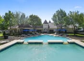 Thumbnail 4 of 14 - Two Sparkling Pools with Sundeck. at Franciscan of Arlington, Arlington, Texas