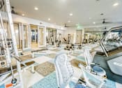 Thumbnail 21 of 34 - a gym with treadmills and other exercise equipment at the renaissance valencia resort