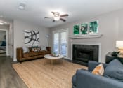 Thumbnail 12 of 13 - Living Room with Fireplace at The Atlantic Newtown, Alpharetta