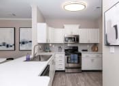 Thumbnail 1 of 20 - Kitchen at The Atlantic River West, Atlanta