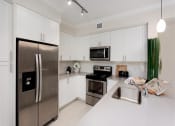 Thumbnail 28 of 29 - Kitchen at The Atlantic Palms at Tradition, Florida, 34987