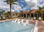 Thumbnail 13 of 29 - Resort-Inspired Beach Entry Pool with Sundeck. at The Atlantic Palms at Tradition, Port St Lucie, FL