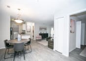 Thumbnail 6 of 13 - Model. Dining Room Area.