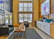Thumbnail 15 of 18 - Resident Lounge with Coffee Station at Magnolia Terrace, Charlotte, NC