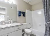 Thumbnail 7 of 16 - Bathroom with a shower and a sink and a toilet at The Atlantic Briarcliff, Georgia, 30329