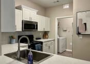 Thumbnail 2 of 20 - Kitchen and Laundry Room at The Atlantic River West, Georgia, 30336