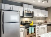 Thumbnail 1 of 12 - Kitchen at Sloan Square, Atlanta, Georgia.