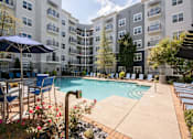 Thumbnail 2 of 11 - Resort Inspired Saltwater Pool with Sundeck at The Atlantic Aerotropolis, Atlanta, Georgia