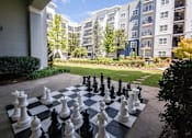 Thumbnail 1 of 11 - Outdoor Entertaining Spaces with Oversized Chess Game at The Atlantic Aerotropolis, Atlanta, Georgia