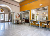 Thumbnail 34 of 34 - A kitchen with a dining table and chairs at Reserve at Canyon Creek,San Antonio, Texas
