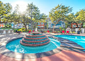 Thumbnail 5 of 34 - A pool with a fountain in the middle of it at Reserve at Canyon Creek,Texas