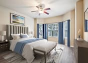 Thumbnail 30 of 34 - A bedroom with a large bed and a ceiling fan at Reserve at Canyon Creek,San Antonio,TX