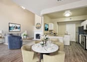 Thumbnail 15 of 34 - Appearance Of kitchen and living room with sofa set and tables at Reserve at Canyon Creek, San Antonio, TX