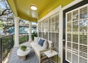 Thumbnail 24 of 34 - Balcony with sofa set at Reserve at Canyon Creek, San Antonio, Texas