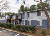 Thumbnail 2 of 16 - Apartment building exterior at The Atlantic North Springs, Dunwoody, GA, 30350.