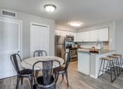 Thumbnail 16 of 16 - Kitchen and Dining Room area at The Atlantic Grand Oaks, Austin, Texas