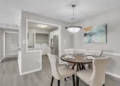 Thumbnail 3 of 16 - Dining room with a table and chairs at The Atlantic Briarcliff, Atlanta, GA, 30329